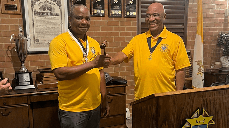 Handing over of the gavel by the outgoing Grand Knight to the incoming Grand Knight at Mother Seton Council 5381
